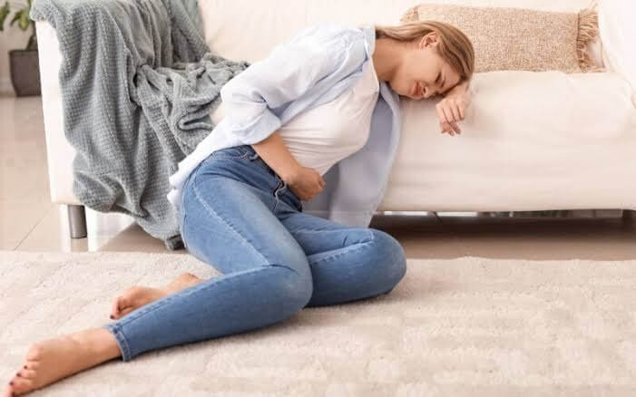 Spotting before period